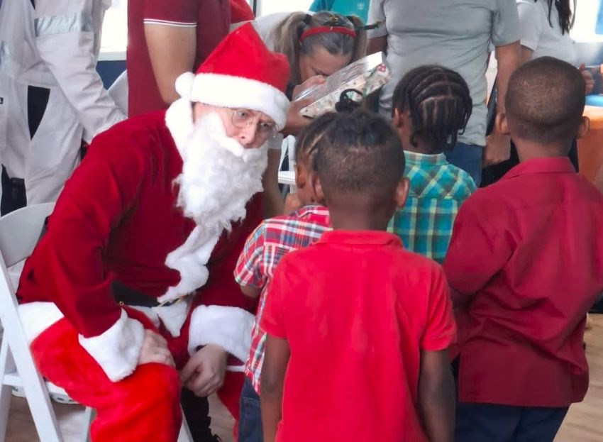 Holiday Cheer Comes Early For Primary School Children